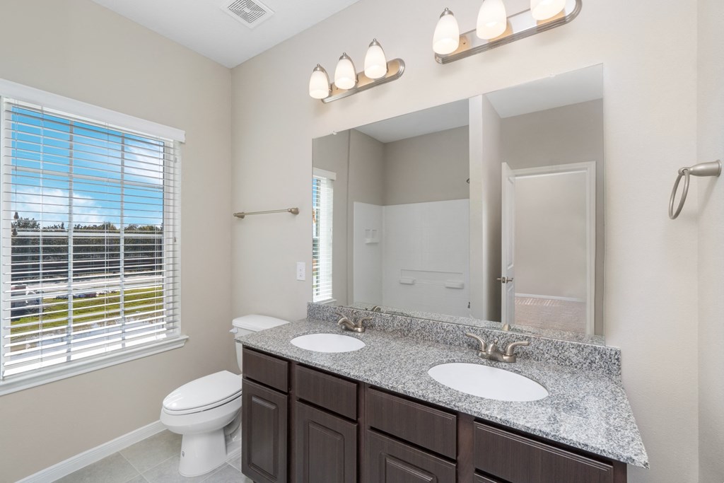 Bathroom With Vanity Lights at Mirror Lake Pearland, Pearland, 77584