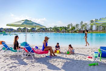 A family is relaxing by the pool on a sunny day.