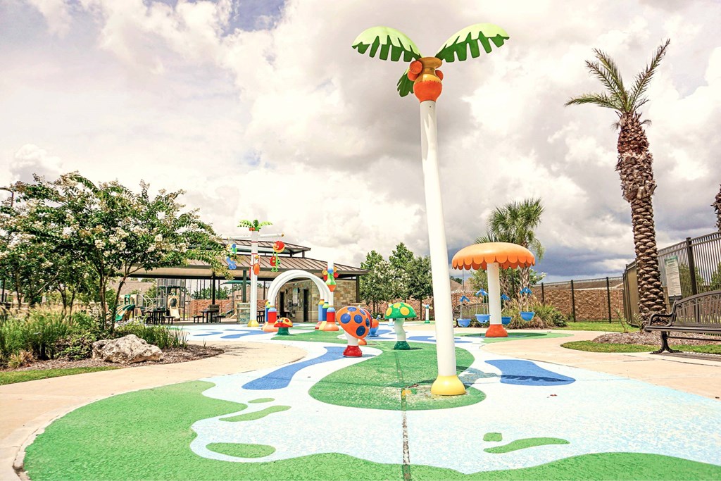 A playground with a slide, swings, and a climbing structure.