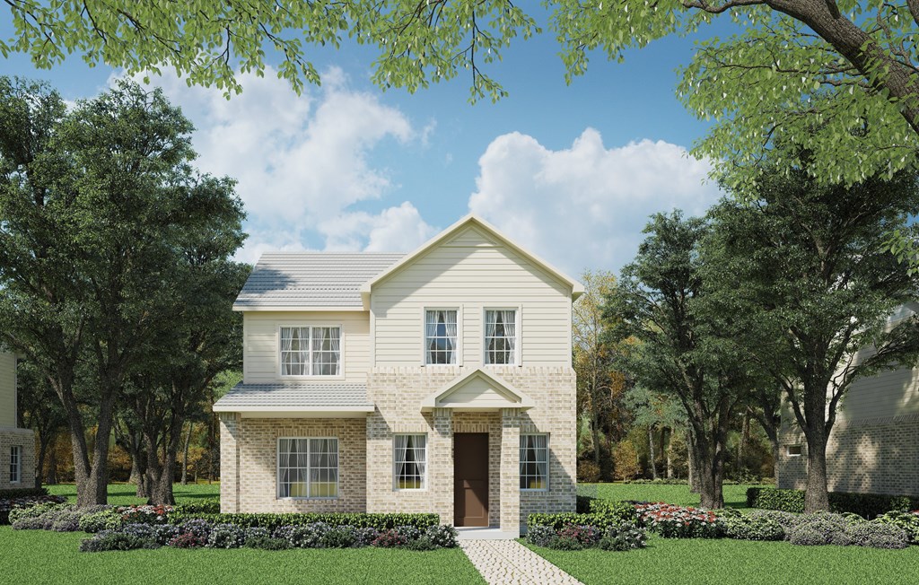 A house with a front yard and trees.