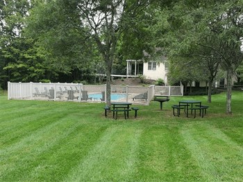 View of Green space and pool at Silvertree Apartments - Photo Gallery 6