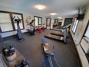 View of Fitness Center at Silvertree Apartments showing cardio machines