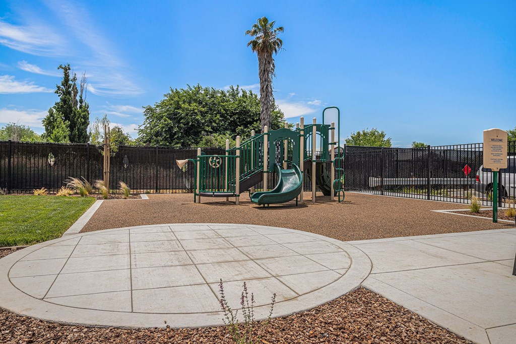 a playground at the whispering winds apartments in pearland, tx