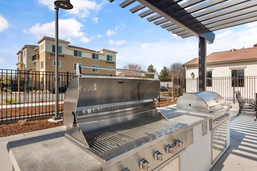 take advantage of the grill area at the whispering winds apartments in pearland, tx