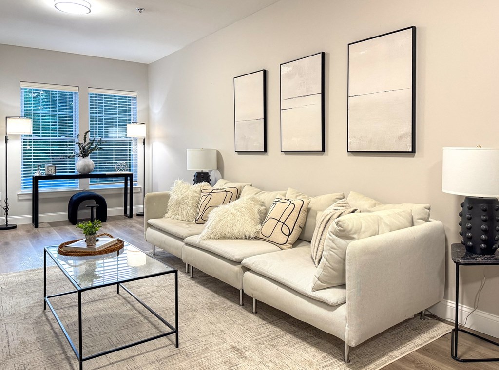 a living room with a couch and a table