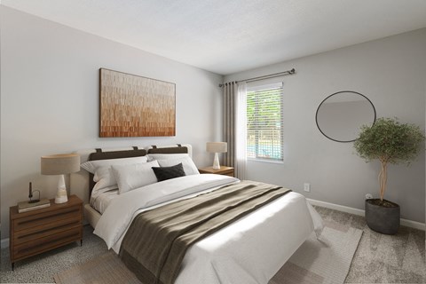 A bedroom with a large bed, a nightstand with a lamp, a plant, and a painting on the wall.