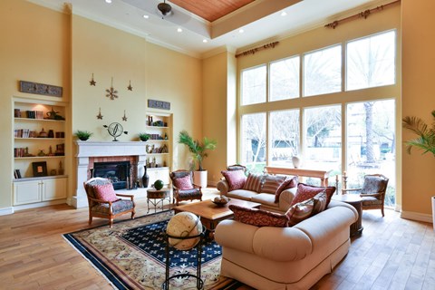 A living room with a fireplace and a couch.