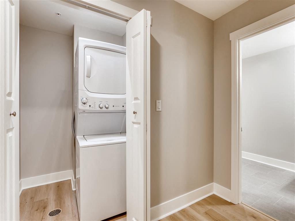a small laundry room with a washer and dryer in it