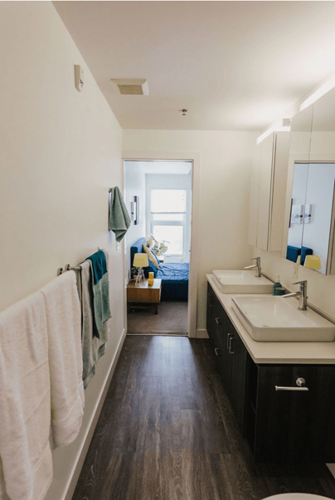 a small bathroom with a sink and a mirror