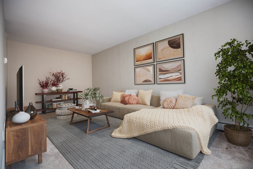 a living room with a couch and a table