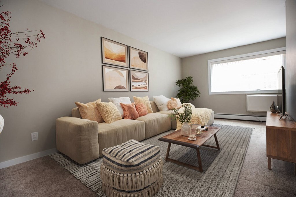 a living room with a couch and a coffee table
