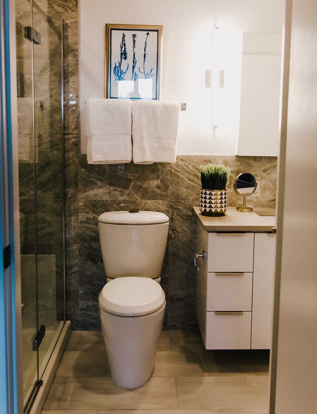 a small bathroom with a toilet and a shower