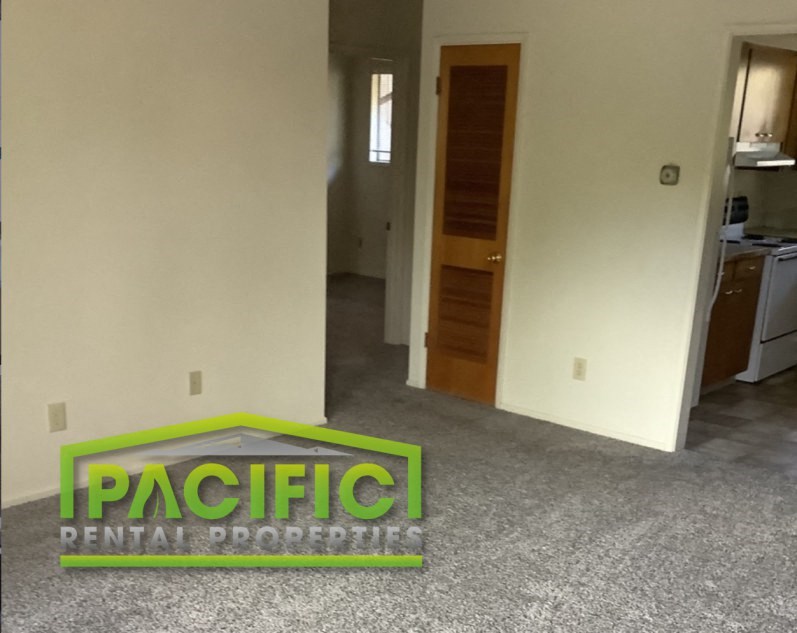 a sign that says pacific dental properties on the floor of a house