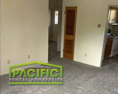 a sign that says pacific dental properties on the floor of a house