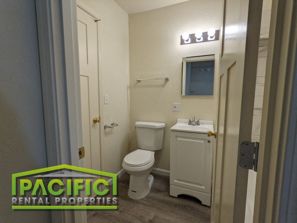 a small bathroom with a toilet and a sink