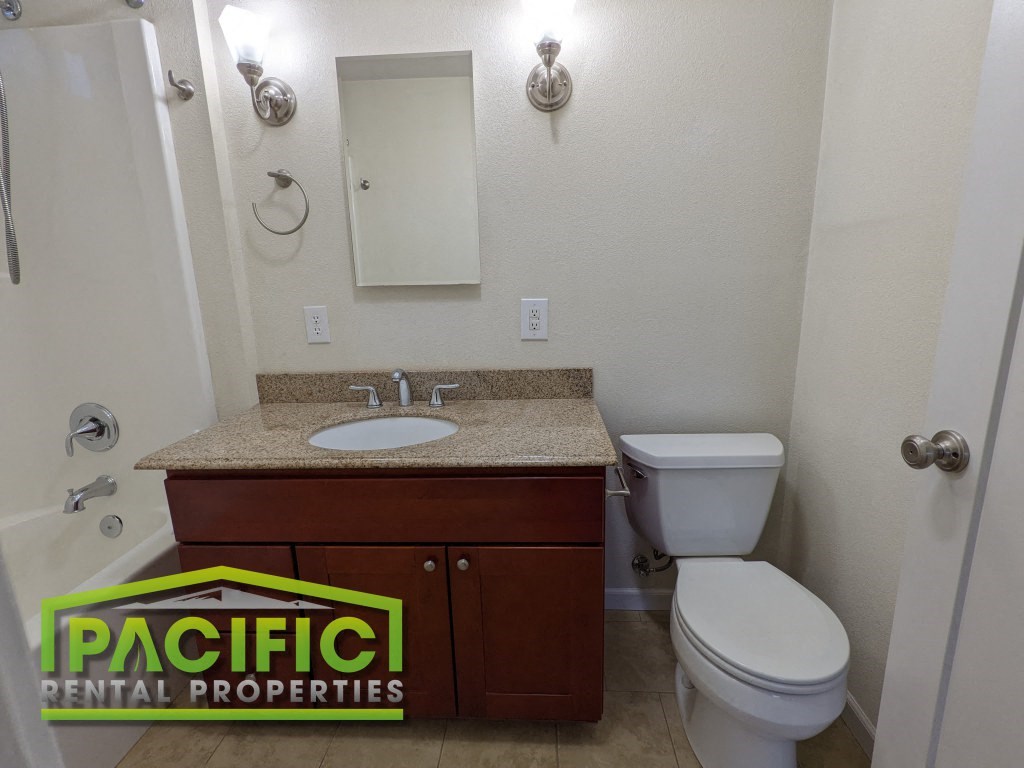 a small bathroom with a toilet and a sink