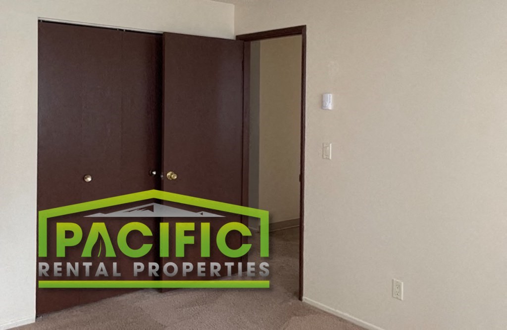 an office door with pacific rental properties logo on it