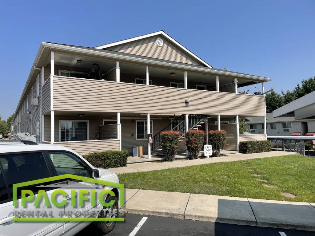 a building with a car parked in front of it