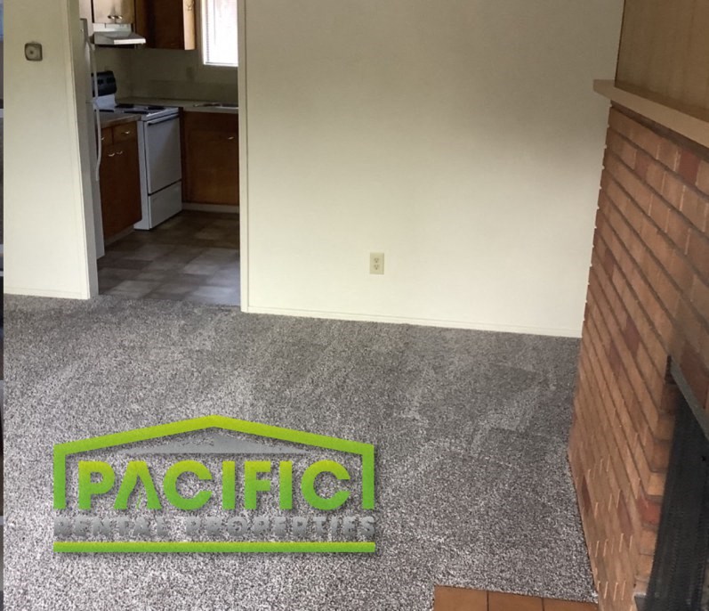 an image of a carpet that says pacific on the floor of a house