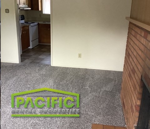 an image of a carpet that says pacific on the floor of a house