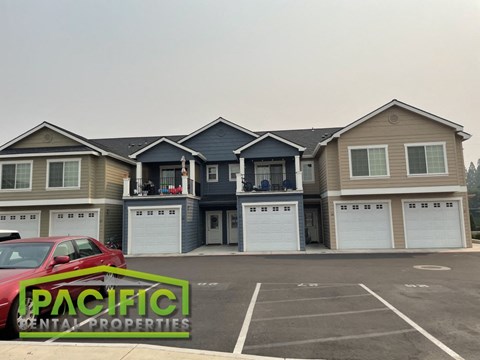 a house with a car parked in front of it