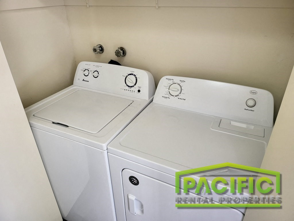 a washer and dryer are available in the laundry room