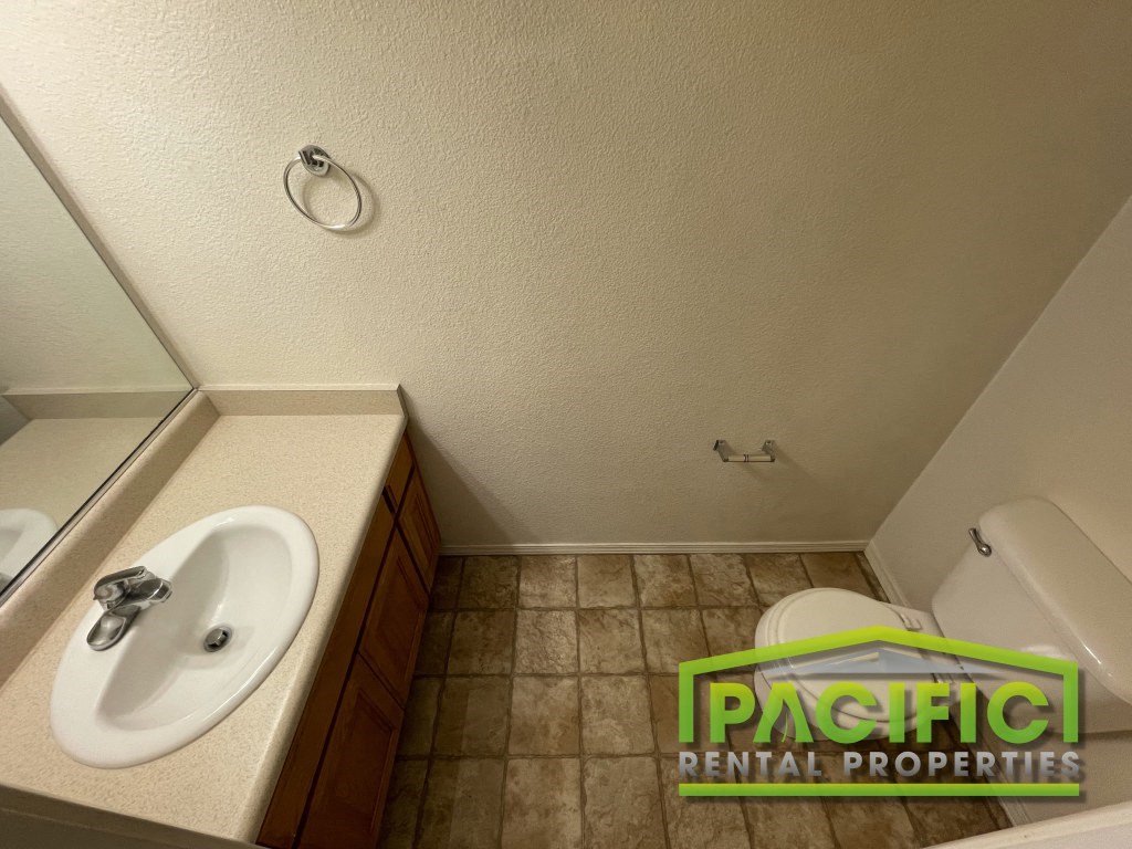 a small bathroom with a toilet and a sink