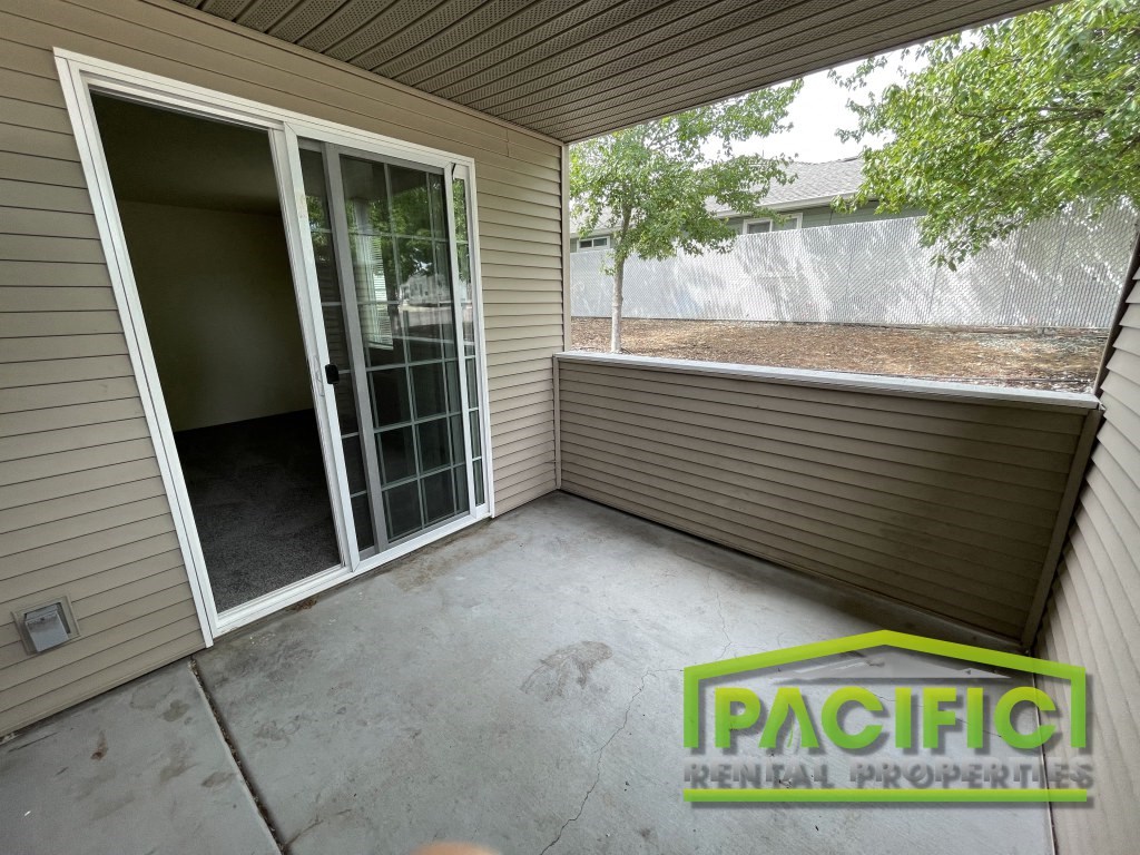 a patio in a home with a sliding glass door