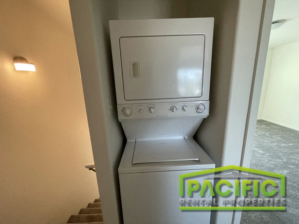 a washer and dryer in a closet