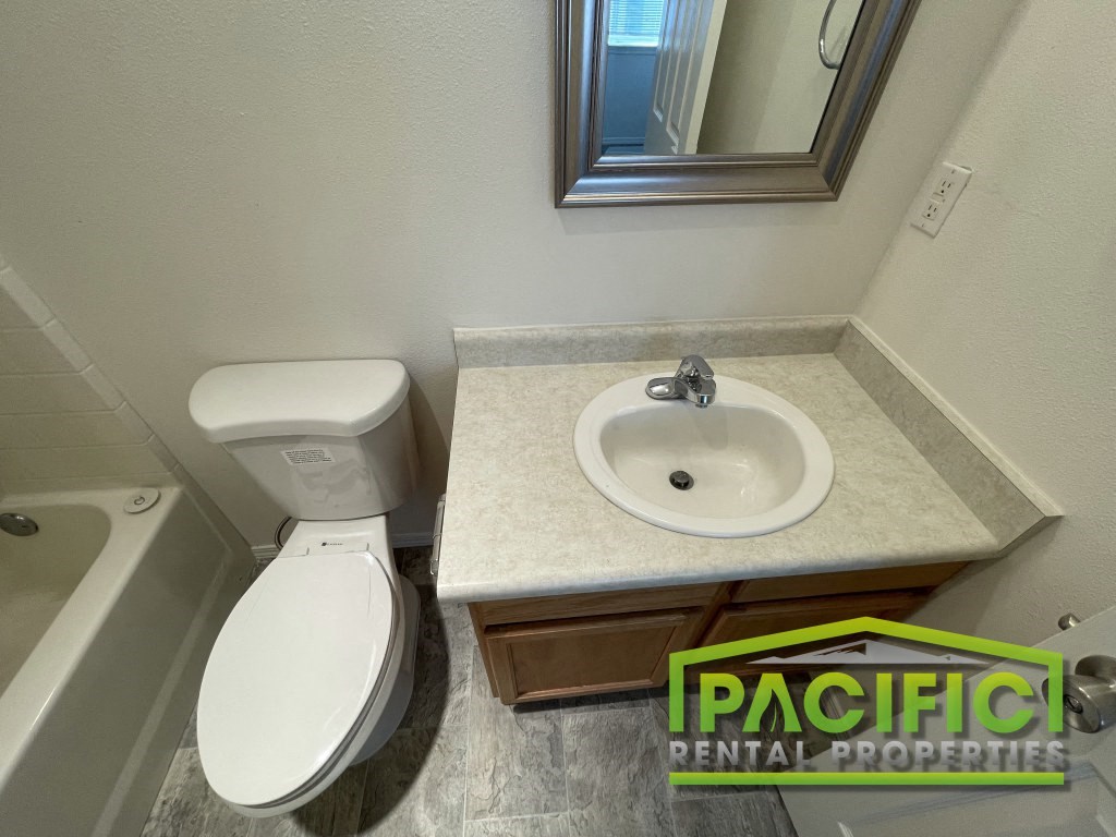 a small bathroom with a toilet and a sink