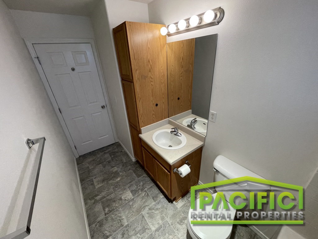 a small bathroom with a sink and a toilet