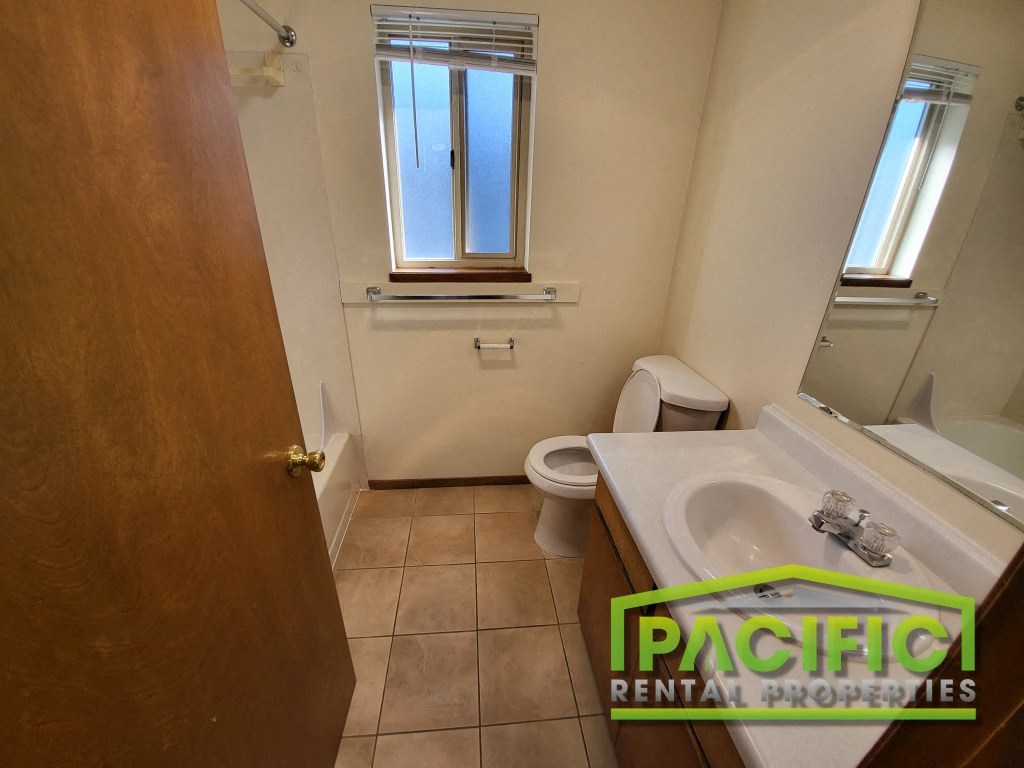 a small bathroom with a toilet and a sink