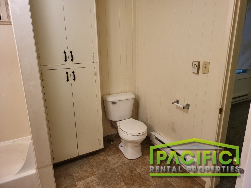 a small bathroom with a toilet and a sink