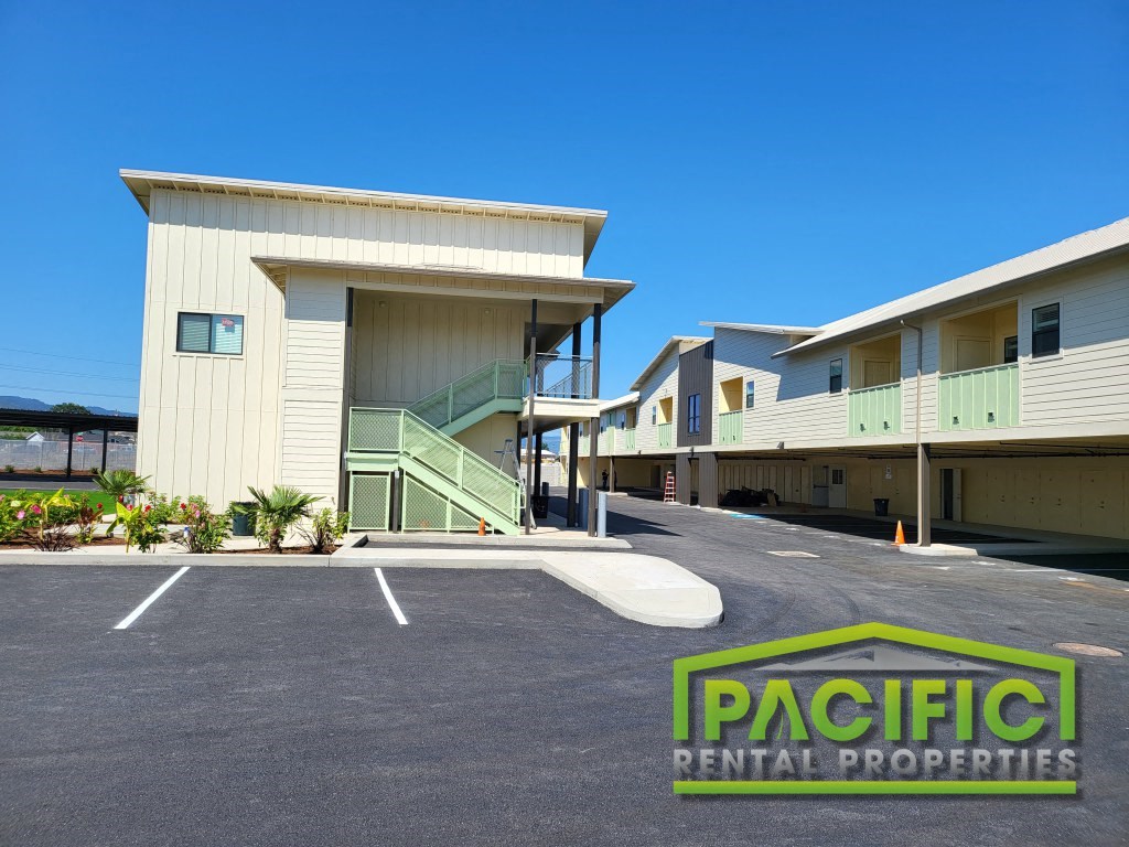 a building with a parking lot in front of it
