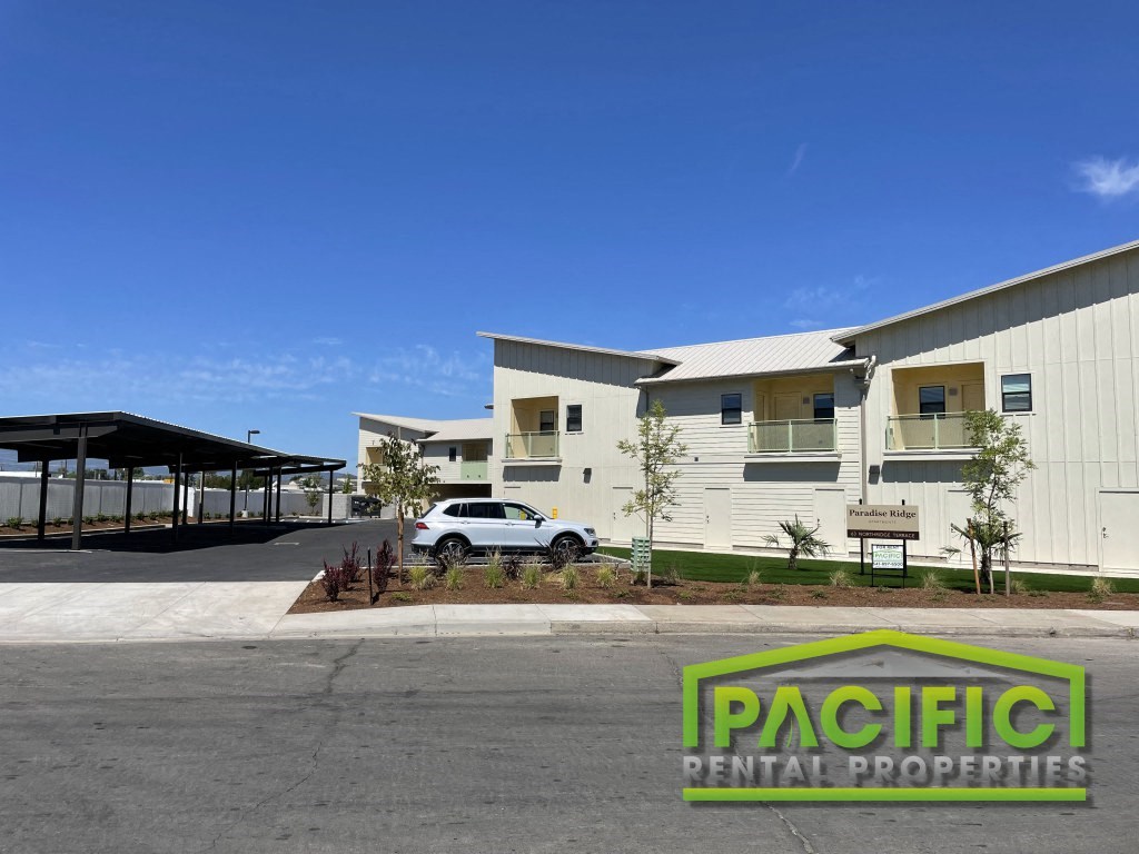 a building with a car parked in front of it