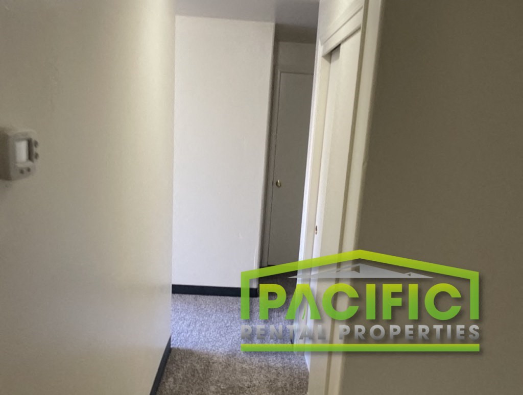 a room with a closet and a door