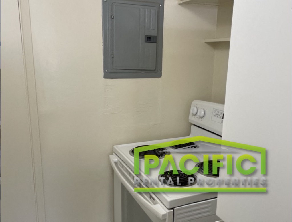 a small laundry room with a washer and dryer