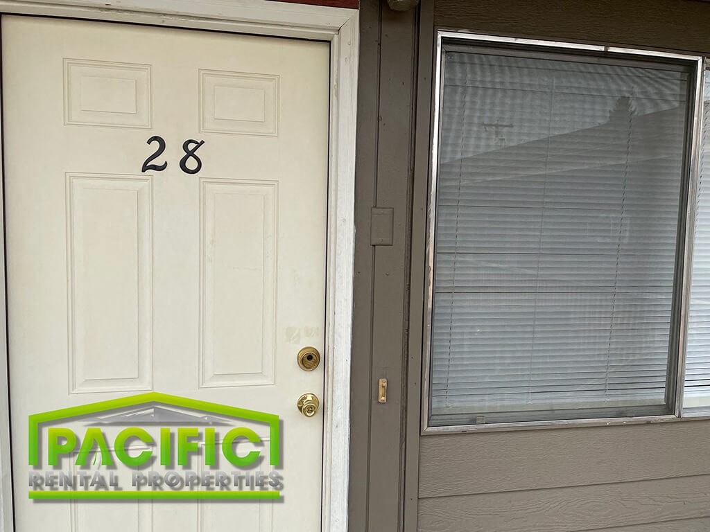 the front door of a house with a pacific nutritional properties logo on it