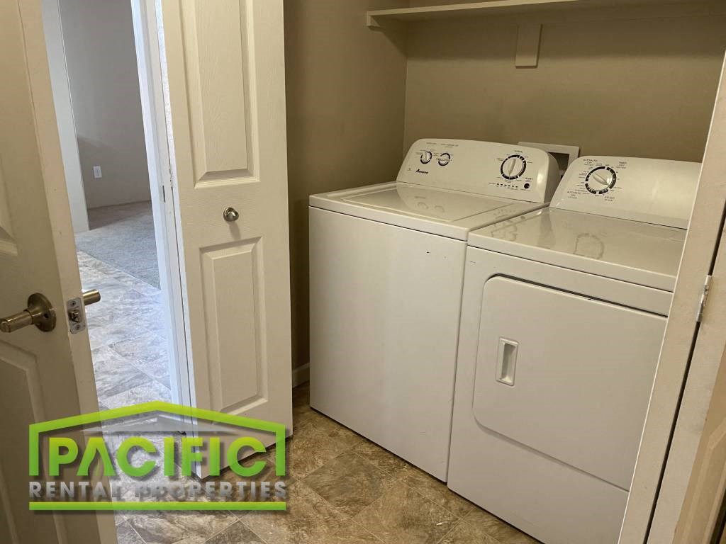 a washer and dryer in the laundry room of a home
