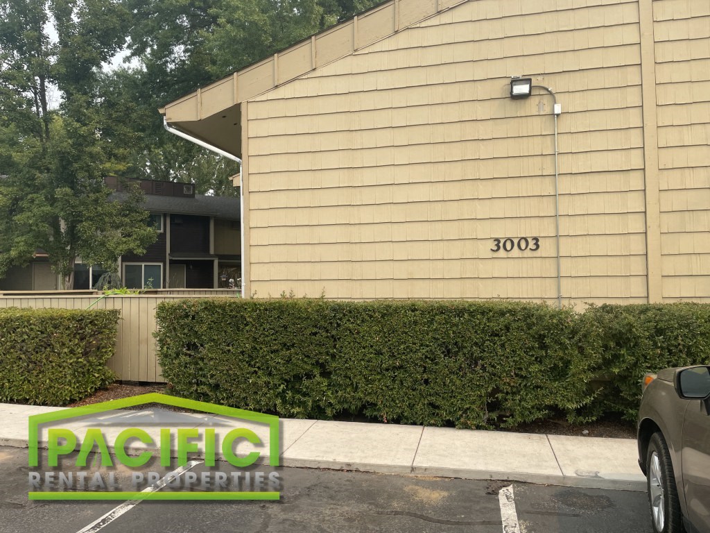 a building with a car parked in front of it