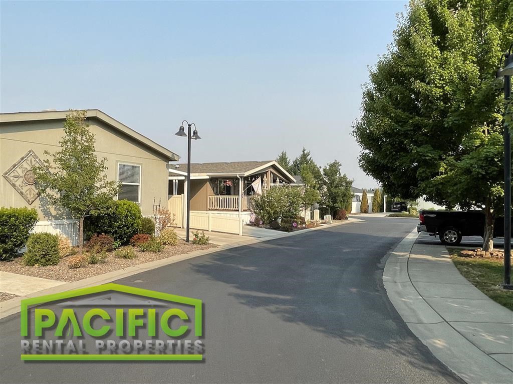 a street with houses on the side of a road