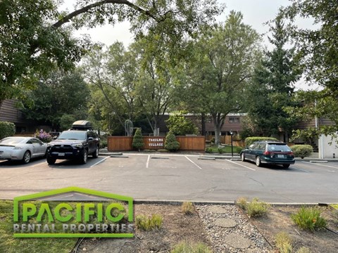 a parking lot with cars parked in it