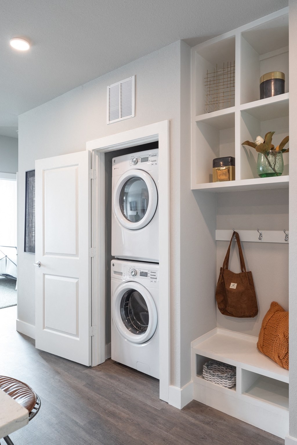 a small laundry room with a washer and dryer