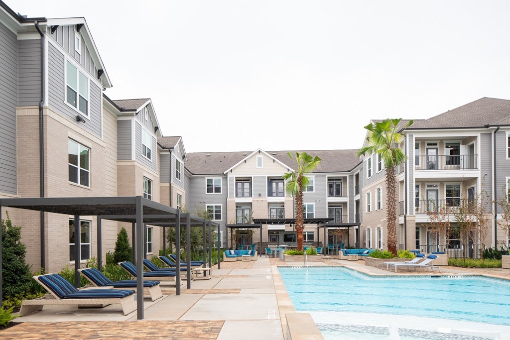 the preserve at ballantyne commons pool and apartment buildings