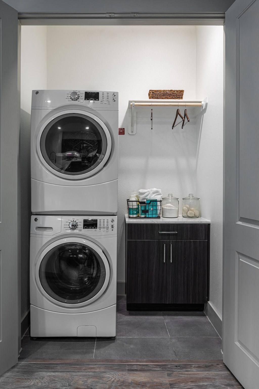 a small laundry room with a washer and dryer