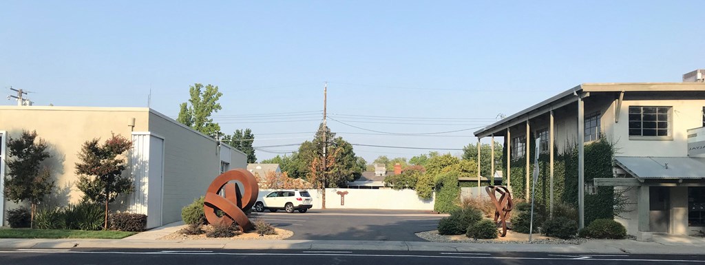 Gratitude sculptures and parking lot