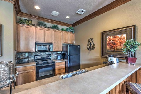 a kitchen with a counter top and a sink