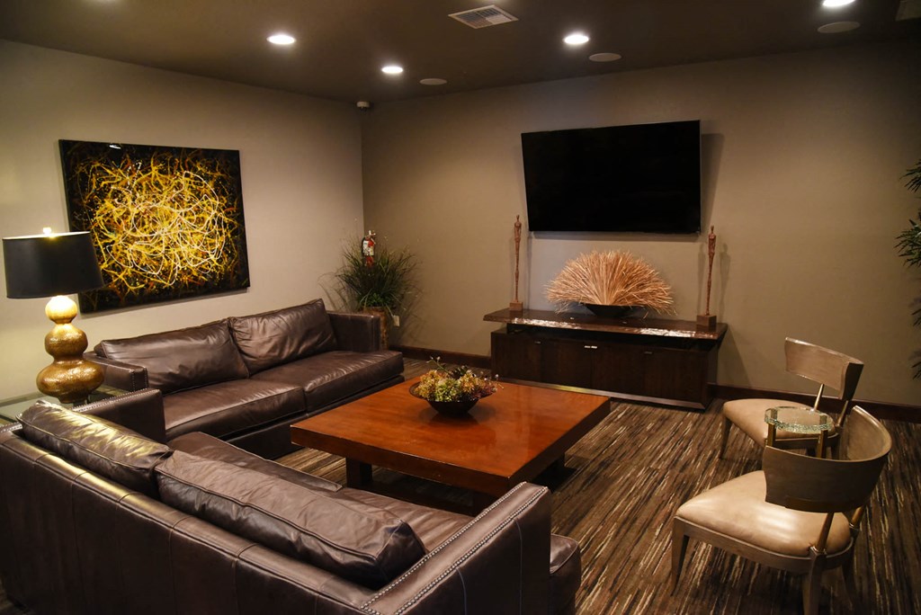 a living room with couches and a coffee table