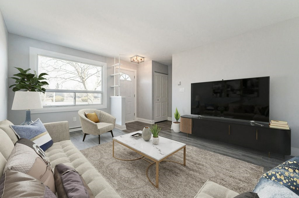 a living room with a couch and a tv