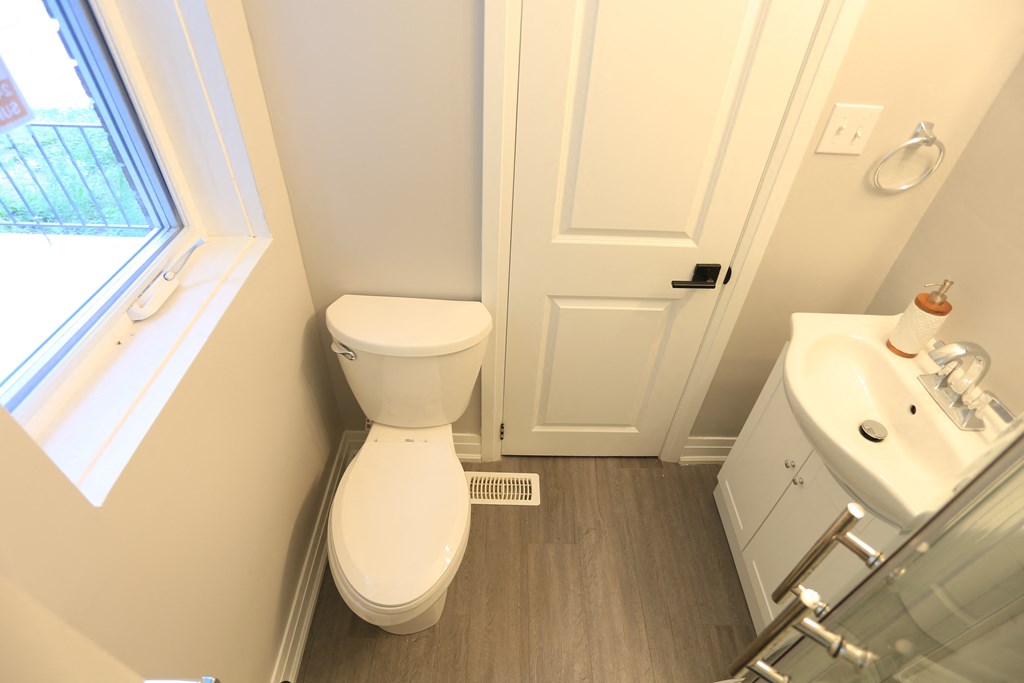 a small bathroom with a toilet and a sink